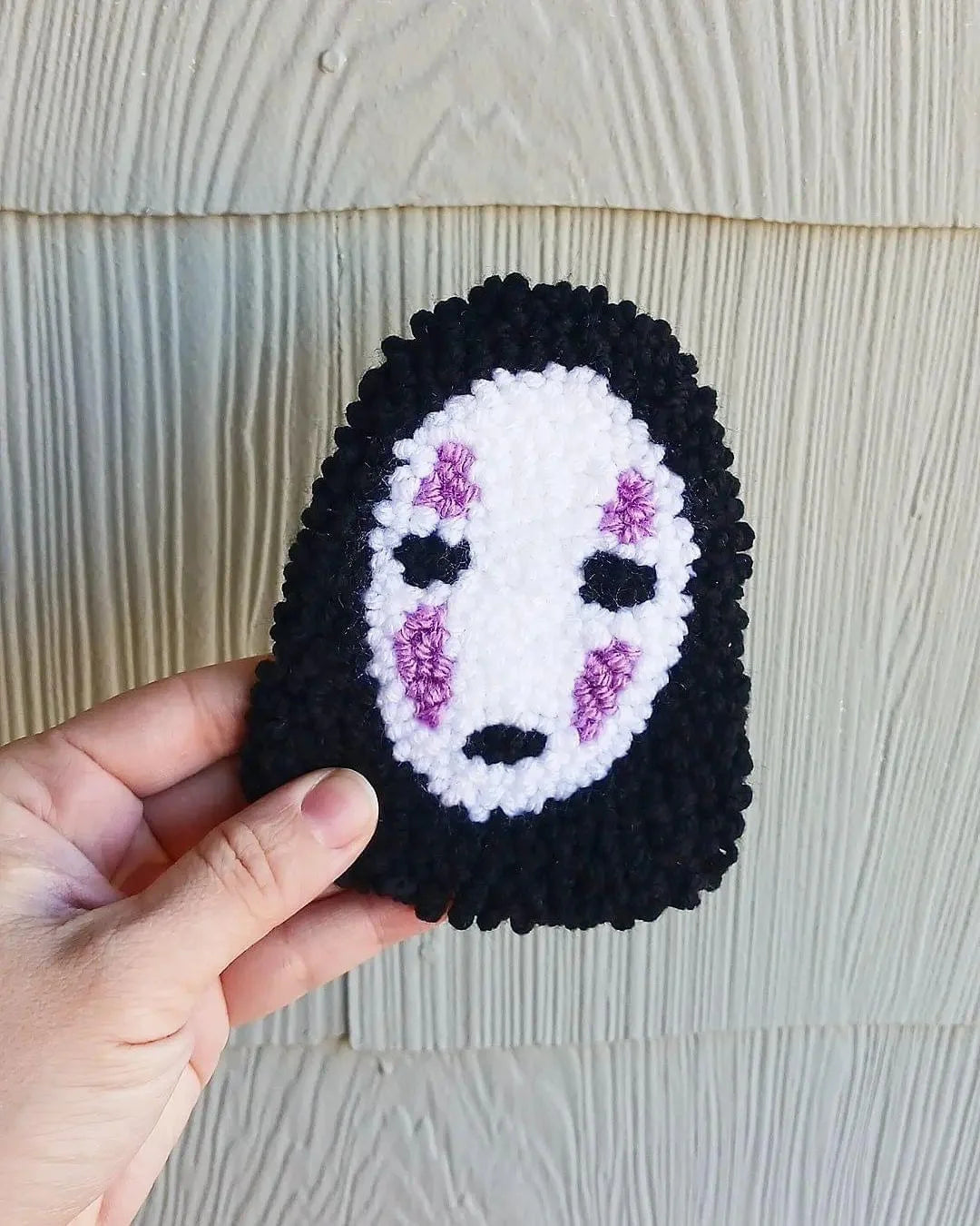 No face inspired desk coaster